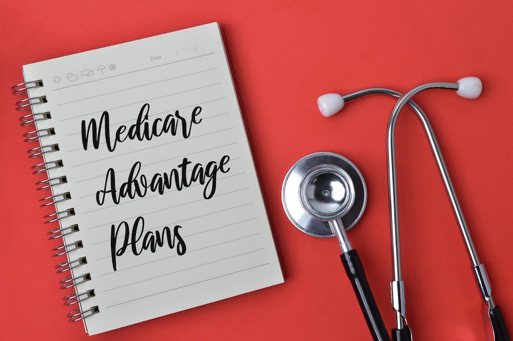 Senior reviewing Medicare Advantage plan benefits
