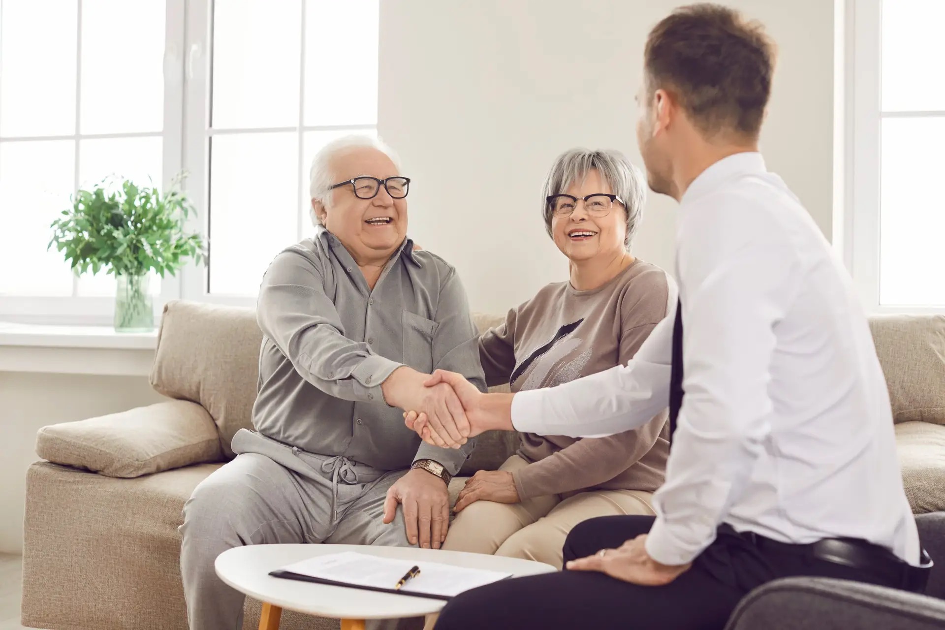 Senior reviewing Medigap open enrollment options with licensed insurance advisor