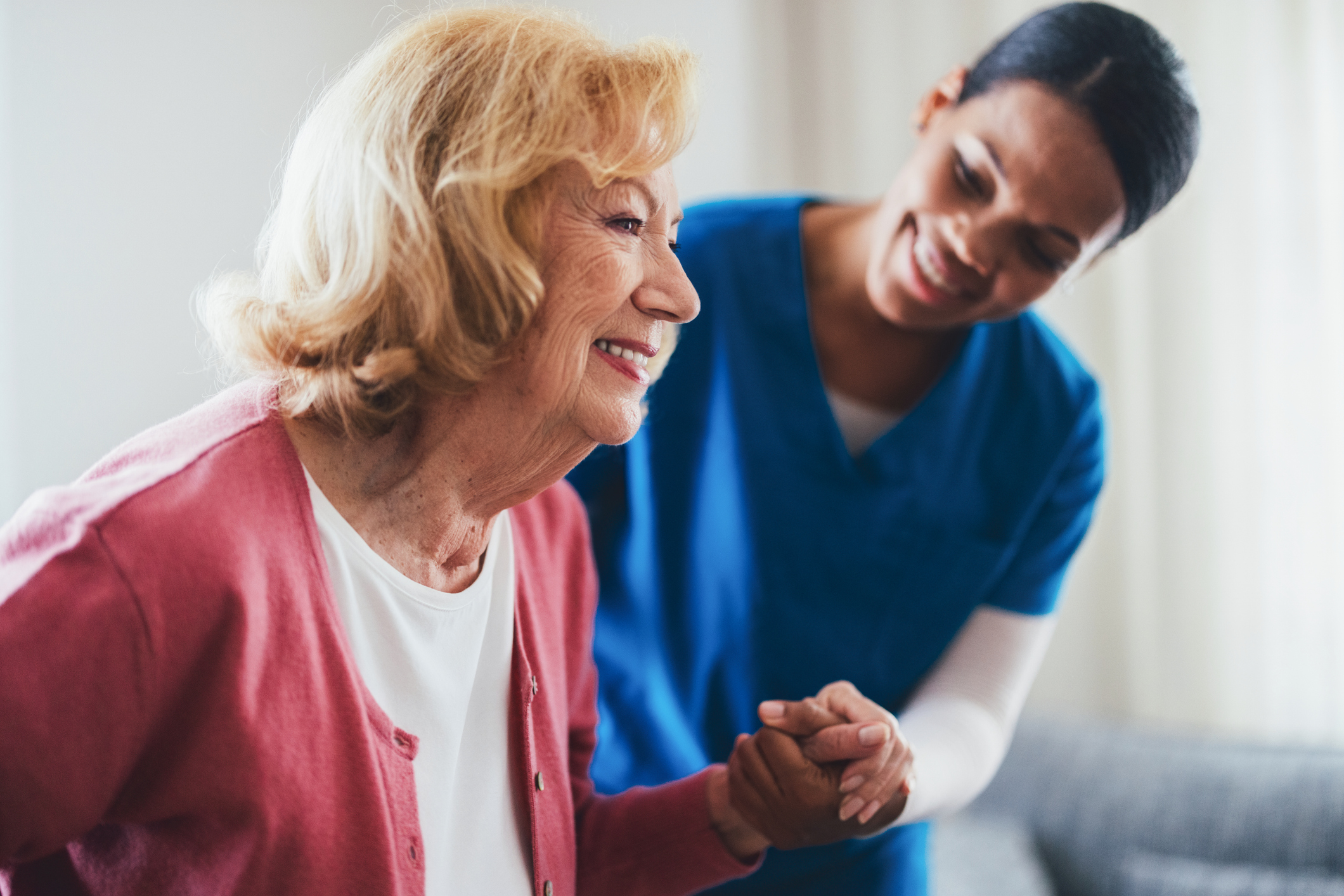 Senior receiving coordinated healthcare benefits through a Medicare Special Needs Plan